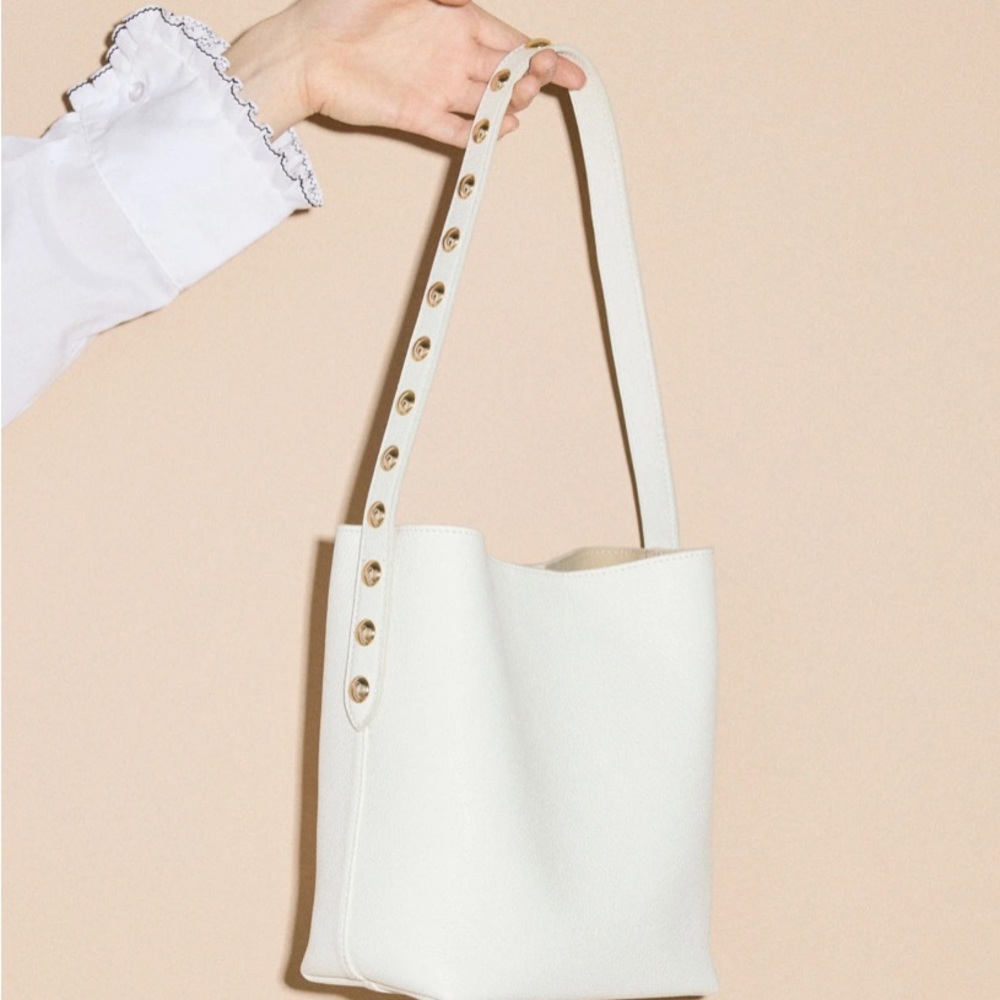 Frēda Salvador Shoulder Bag in Bone Pebbled Calf with Gold Studs 🤍